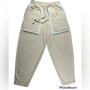 NEW! NIKE loose fit high rise woven pants in tan. Small